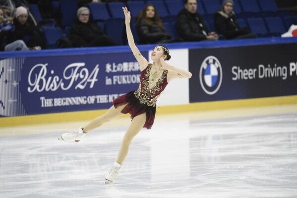 Kaori Sakamoto leads the women's short program at figure